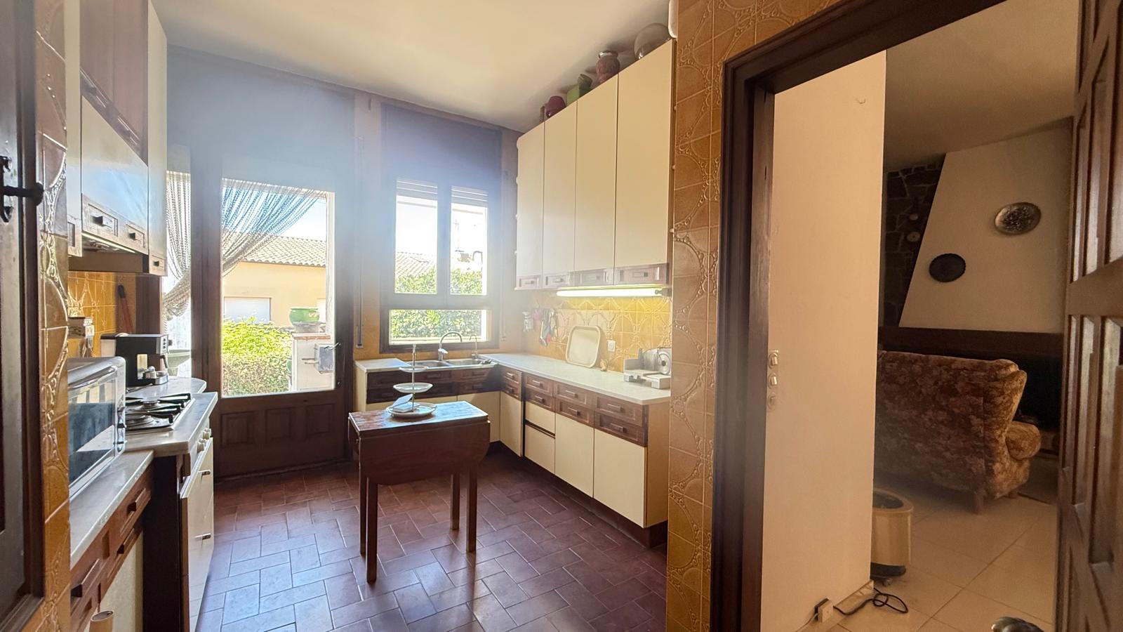 CASA EN VENTA CON GARAJE Y JARDÍN EN EL CENTRO DE PALAFRUGELL